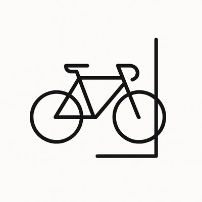 bicyle resting against a wall