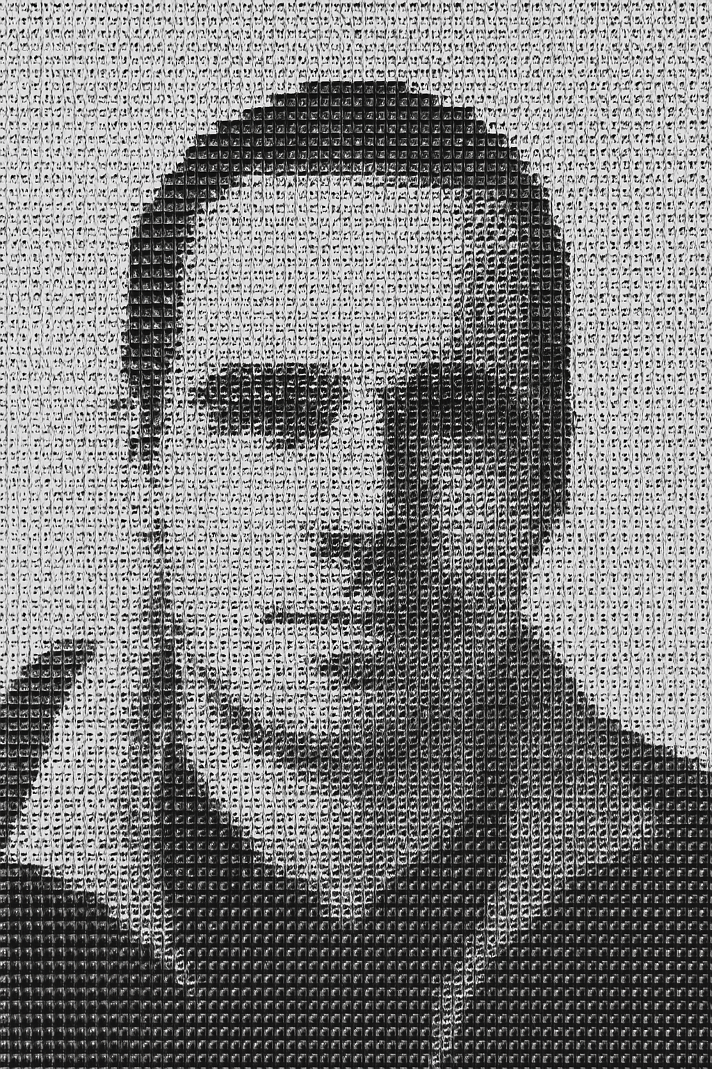 a black and white photo of a man's face