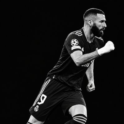 a man with a beard is playing soccer