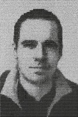 a black and white photo of a man's face