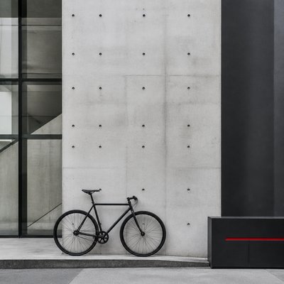 bicyle resting against a wall — Minimalist Modern Art Style