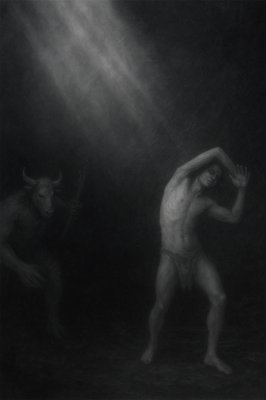 a black and white photo of a man and a bull