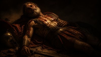 ancient dying greek warrior on the ground with sword by his side