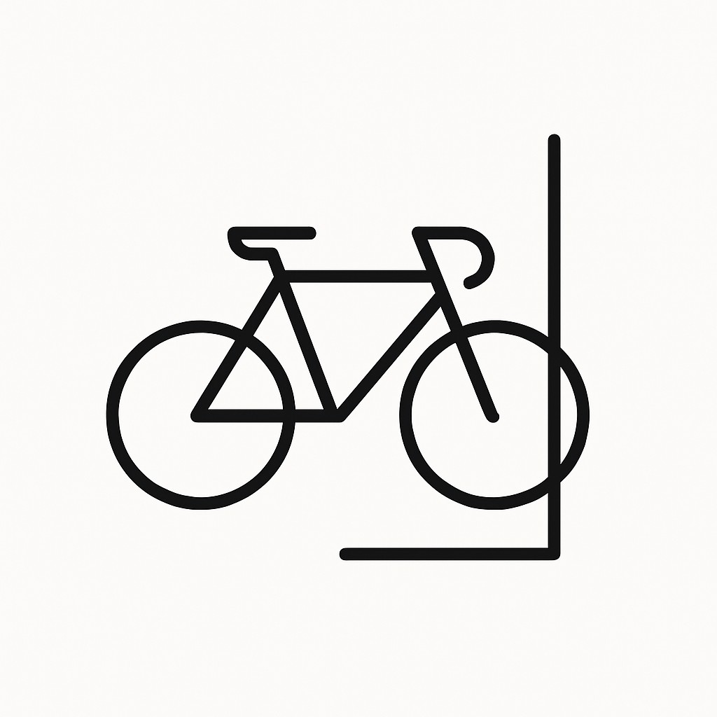 bicyle resting against a wall