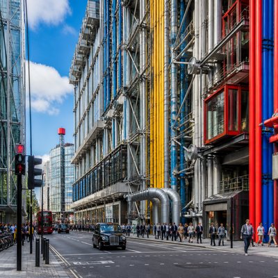 urban street with city activity — High-Tech Architecture
