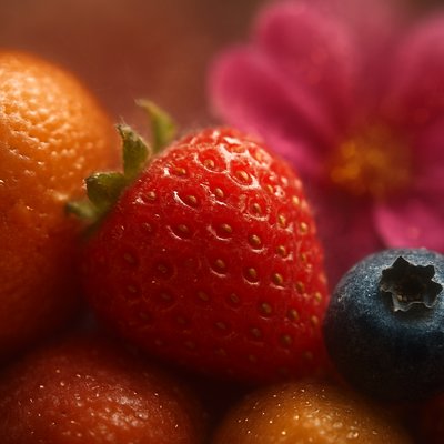 still life arrangement of fruits and flowers