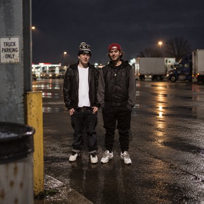 a couple of men standing next to each other