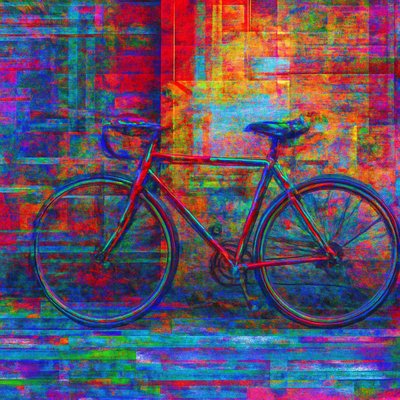 bicyle resting against a wall