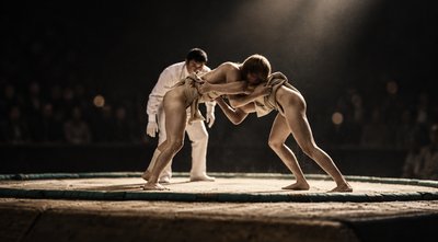 a couple of women standing on top of a stage