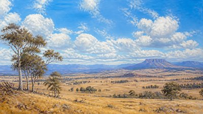 sweeping panoramic landscape with a dramatic sky