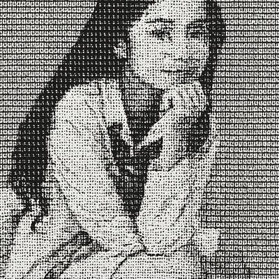 a black and white photo of a woman sitting down