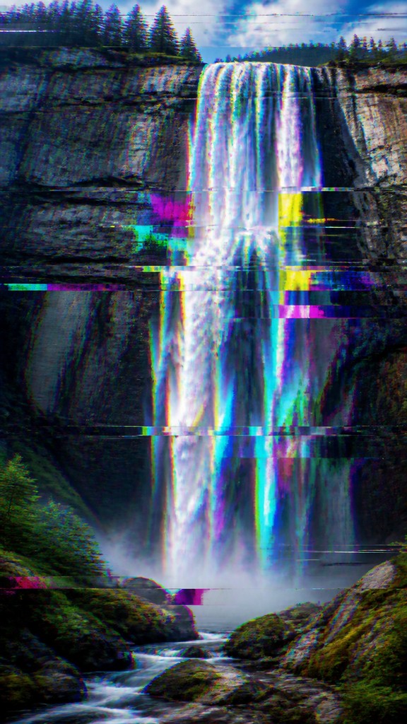 towering waterfall cascading down a cliff
