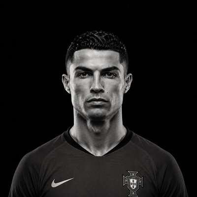 a black and white photo of a soccer player