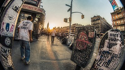 bustling city street panorama at dusk