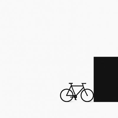 bicyle resting against a wall