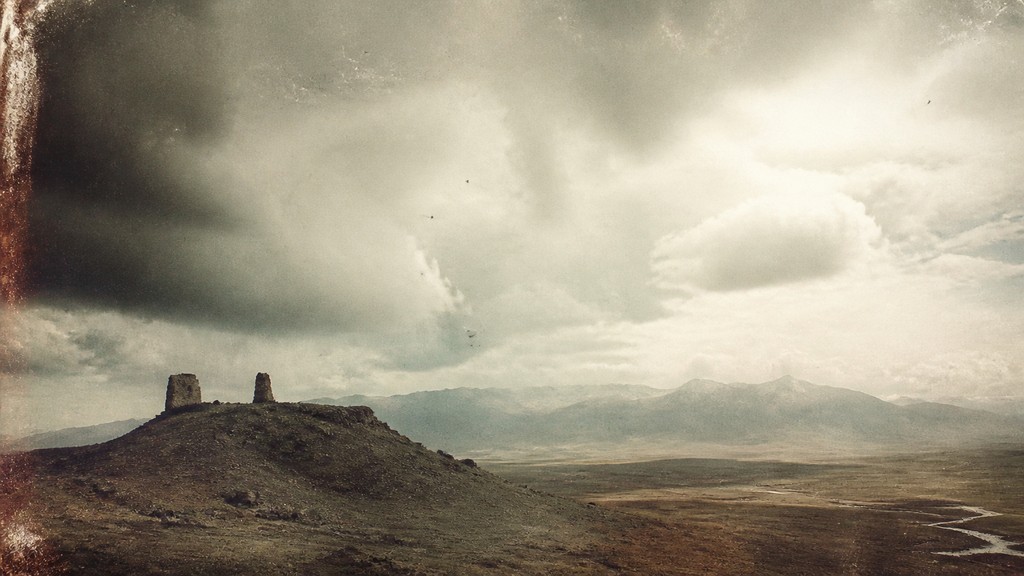 sweeping panoramic landscape with a dramatic sky