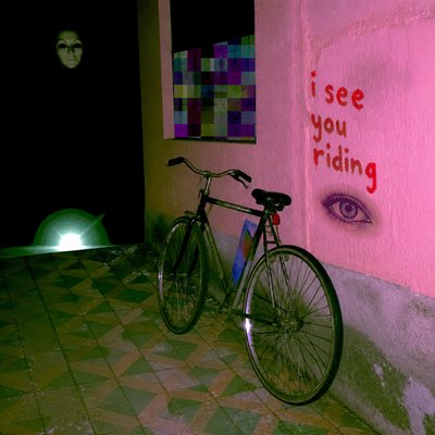 bicyle resting against a wall