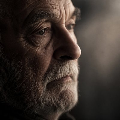 close-up portrait of an elderly person with expressive weathered features