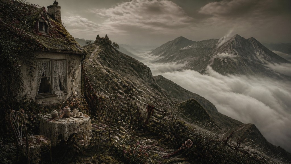 a wide alpine ridge above a sea of clouds, no people