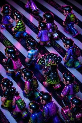 a group of toy figurines sitting on top of a table