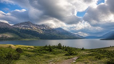 sweeping panoramic landscape with a dramatic sky