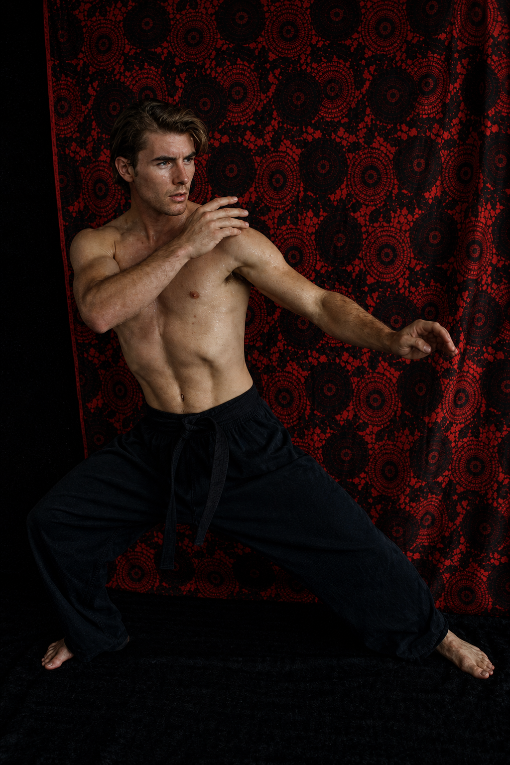 a shirtless man is posing for a picture