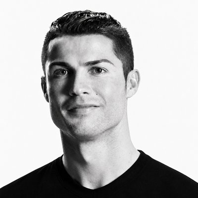 a black and white photo of a young man