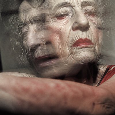 close-up portrait of an elderly person with expressive weathered features