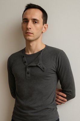 a man with his hands on his hips