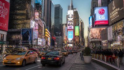 bustling city street panorama at dusk