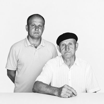 a black and white photo of two men