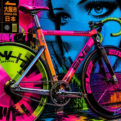 bicyle resting against a wall
