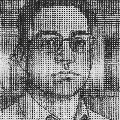 a black and white photo of a man wearing glasses