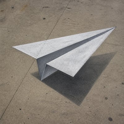 a paper plane, clean minimal composition on a plain background, no text