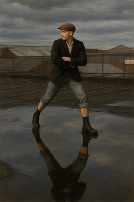 a man standing in the rain with his arms crossed