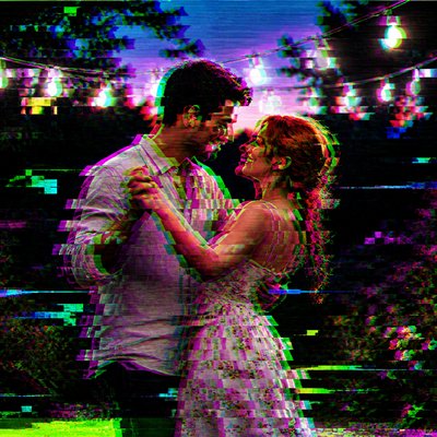an original couple dancing under string lights in a garden at dusk: a man with short black hair in a linen shirt and a woman with braided red hair in a summer dress