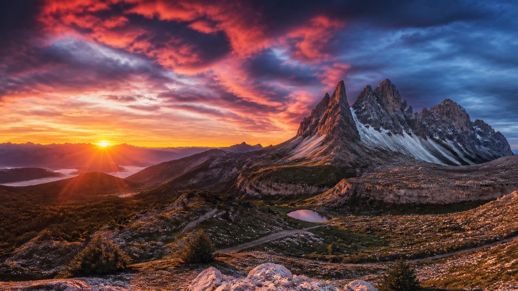 sweeping panoramic landscape with a dramatic sky
