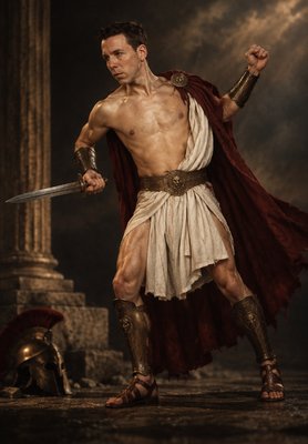 a man in a roman costume holding a sword