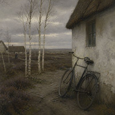 bicyle resting against a wall