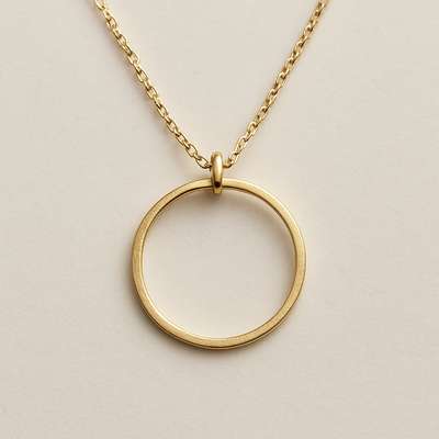 a single thin gold circle pendant