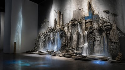 a cliffside city with waterfalls cascading into a misty canyon, wide establishing shot, no people, no text