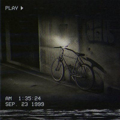 bicyle resting against a wall