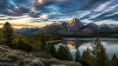 sweeping panoramic landscape with a dramatic sky