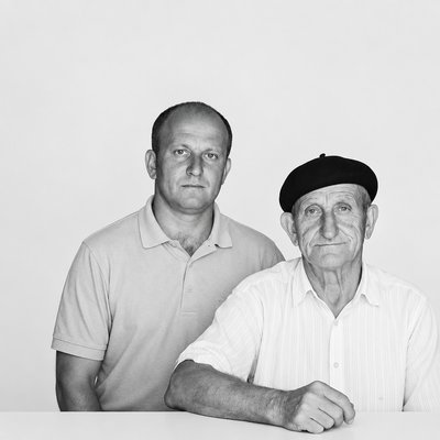 a black and white photo of two men