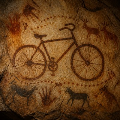 bicyle resting against a wall — Prehistoric Cave Art Style