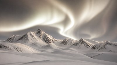 a flowing aurora over snowy peaks, wide sweeping composition, no people, no text