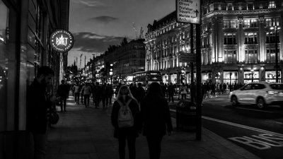 bustling city street panorama at dusk