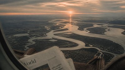 a wide river delta seen from above at sunset, no people
