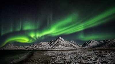 a flowing aurora over snowy peaks, wide sweeping composition, no people, no text