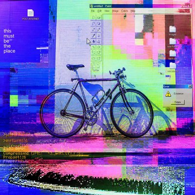 bicyle resting against a wall